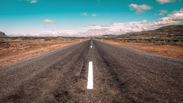 Image of a road narrowing off into the distance