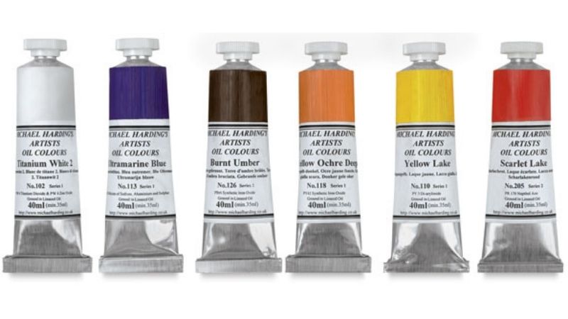 a row of the highest quality and best oil paints in tubes